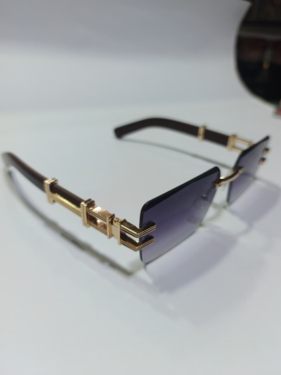 Premium Rimless EyeWear SunGlasses With Gold Details